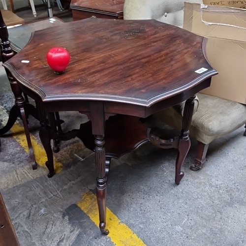 468 - Star Lot : A very handsome dark mahogany Octagonal Table, early 20th century, features reeded legs a... 