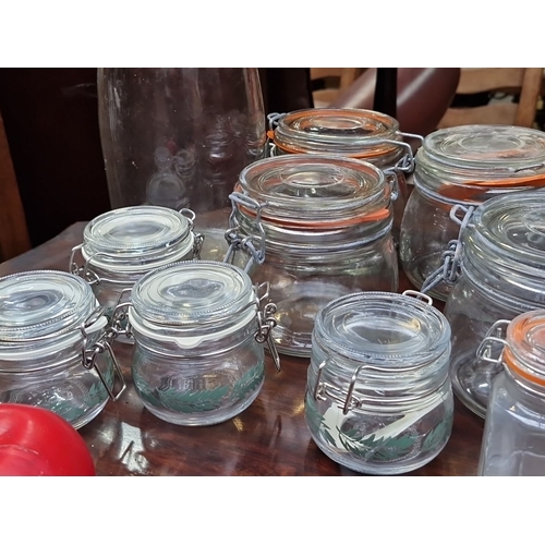 469 - Collection of 16 assorted glass preserving jars with clip-top lids, varying sizes, plus unused rubbe... 