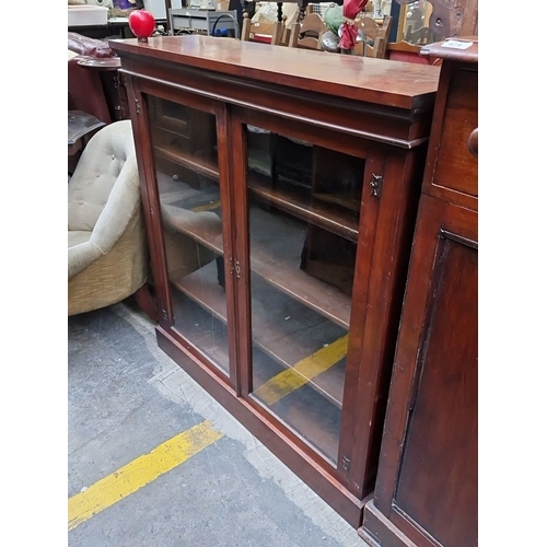 471 - Star Lot : A lovey Victorian Mahogany Bookcase, c. late 19th Century. Features glazed double doors, ... 