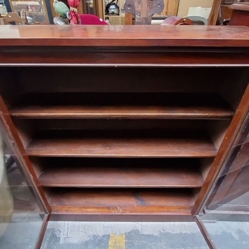 471 - Star Lot : A lovey Victorian Mahogany Bookcase, c. late 19th Century. Features glazed double doors, ... 