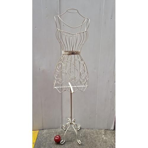 477 - Vintage white wrought iron dress form mannequin features elegant scrollwork design and sturdy constr... 