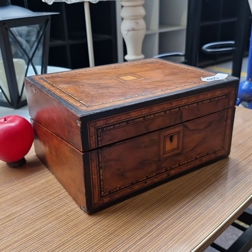 485 - Star Lot : A large Victorian walnut writing slope from the 1850s featuring intricate veneer inlays, ... 