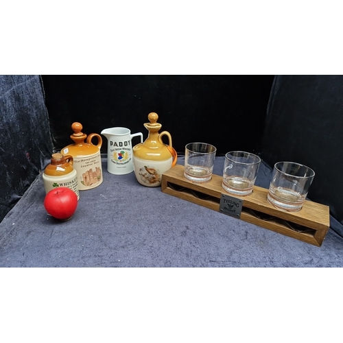 487 - Includes vintage Paddy jug, stoneware decanters, Connemara whiskey glasses with oak stand.