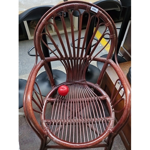 490 - Vintage bentwood and rattan armchair with elegantly curved design and natural finish.