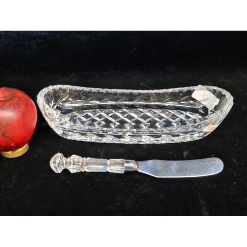 180 - Two pieces of Waterford Crystal including a butter spreader and an oval celery dish in the Glandore ... 