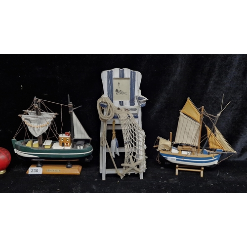 230 - Three nautical themed decorative items including two ships and a lifeguards chair.  From the fabulou... 