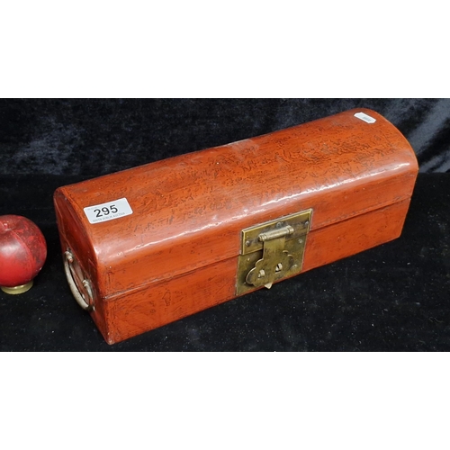 295 - A beautiful antique red lacquered leather Chinese scroll box. Features a hidden compartment to insid... 