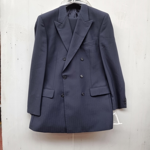 371 - Star lot :A classic and stylish gentlemen's navy blue Baumler suit, originally purchased from John T... 