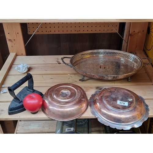 379 - Four antique items including a cast iron iron, and a Victorian silverplated serving tray featuring c... 