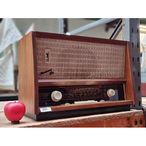 398 - A Romance FM 1961 Schneider Frères, Radio. Comps price $95 via eBay