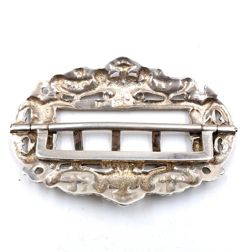 593 - A sterling silver antique shoe buckle hallmarked Birmingham. Weight - 43.15 grams. Boxed.