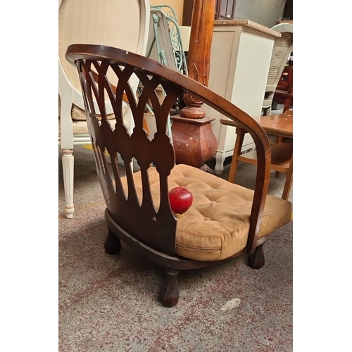 646 - Vintage wooden mid century nursing chair, features an elegant lattice backrest and plush tufted seat... 