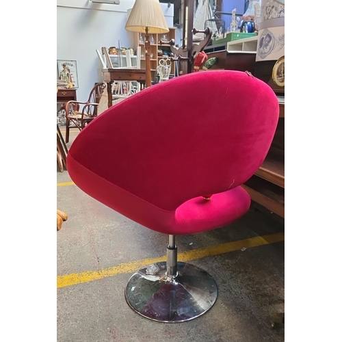 647 - Star Lot : Retro modern crimson swivel chair with a chrome pedestal base and an ergonomic crescent s... 