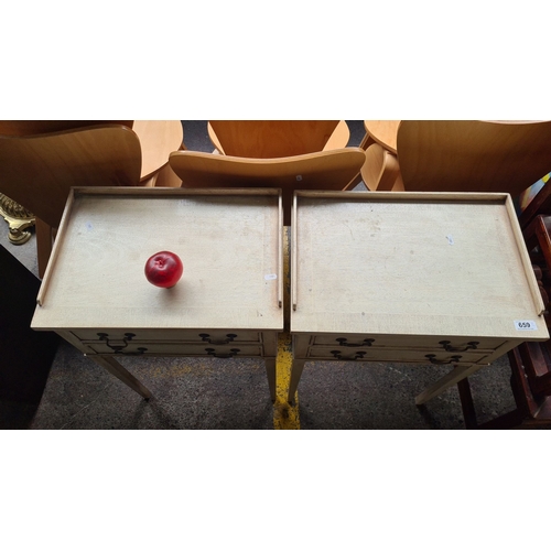 659 - Star Lot : A lovely Pair of vintage cream-painted side tables, each with two drawers, brass handles,... 