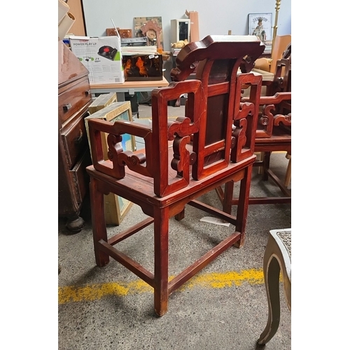 660 - Star Lot : A fabulous Pair of intricately carved Chinese-style hardwood armchairs, featuring openwor... 