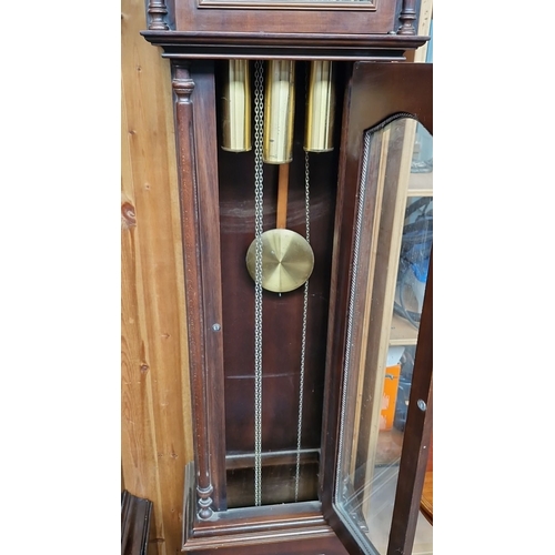 681 - Star Lot : A good looking Mahogany longcase clock features brass weights and pendulum, a classic arc... 