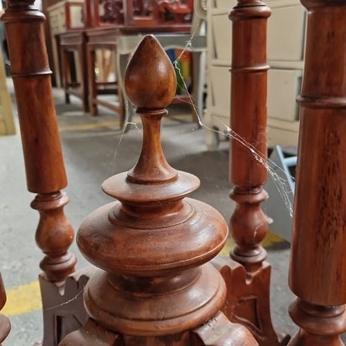 682 - A walnut side table, has an elegant turned pedestal base and scalloped oval top. Rich patina and det... 