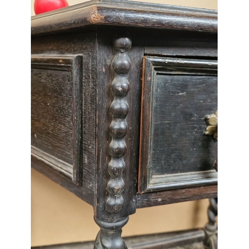 685 - Antique ebonised Oak corner table with barley twist legs, single drawer, and distressed patina from ... 