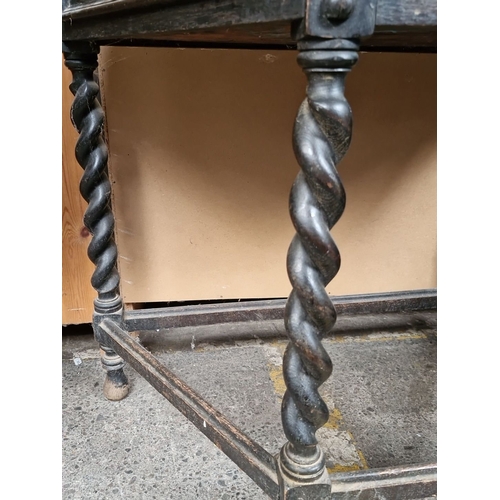 685 - Antique ebonised Oak corner table with barley twist legs, single drawer, and distressed patina from ... 