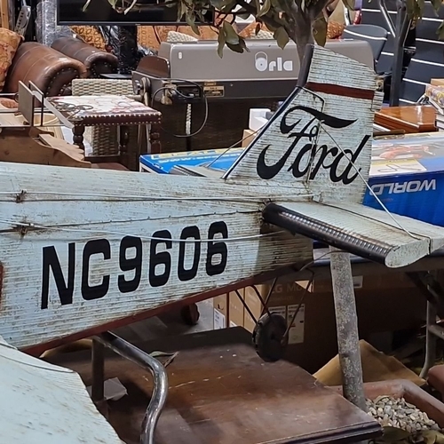 928 - Star lot : An exceptionally large model airplane with radial engine detail. Wood and metal construct... 