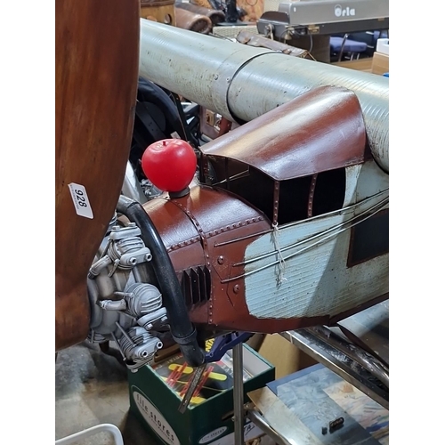 928 - Star lot : An exceptionally large model airplane with radial engine detail. Wood and metal construct... 