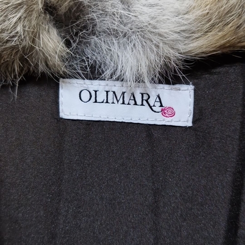 934 - Olimara faux fur jacket in mixed natural tones. It is luxuriously soft with full lining and front zi... 