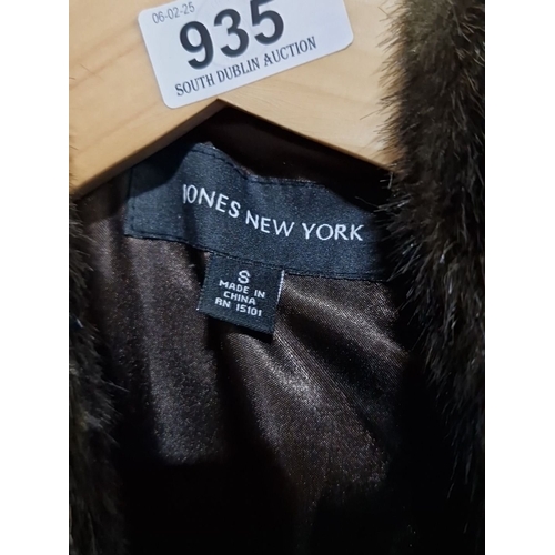 935 - Jones New York faux fur coat, size small, features ruffled trim and a satin lining.