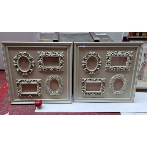 318 - A pair of chic French style picture frames with floral scroll detail to each.