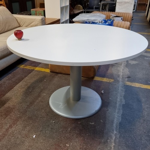 1023 - A good size contemporary modern round table with white surface top and silver toned base. commercial... 