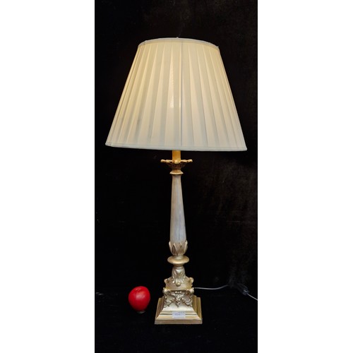 464 - An attractive tall neoclassical style table lamp. Features both floral and elephant head motifs to b... 