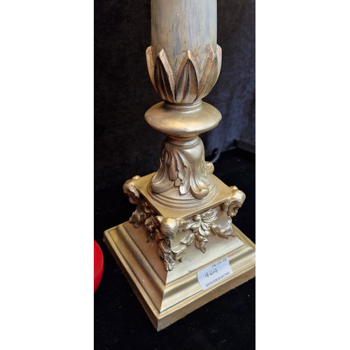 464 - An attractive tall neoclassical style table lamp. Features both floral and elephant head motifs to b... 