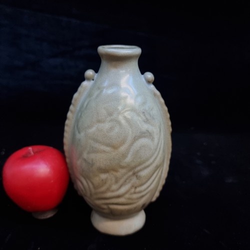 156 - Star Lot : An antique Chinese Celadon vessel /flask. In very good condition.