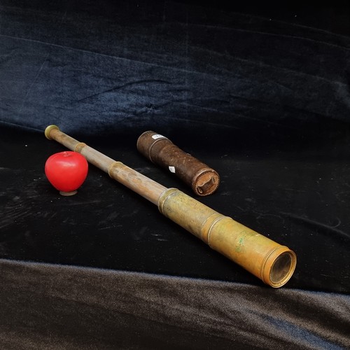 159 - Star Lot : A wonderful 3 draw antique early brass telescope with original leather case.