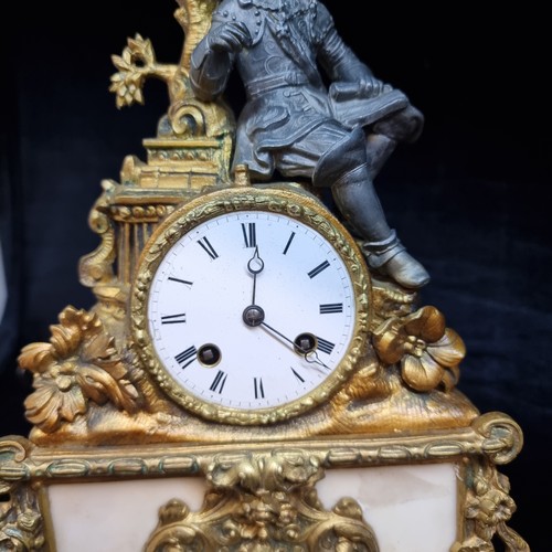 166 - Star Lot An antique gilt brass and spelter figure French 8 day mantel clock. Featuring cream marble ... 