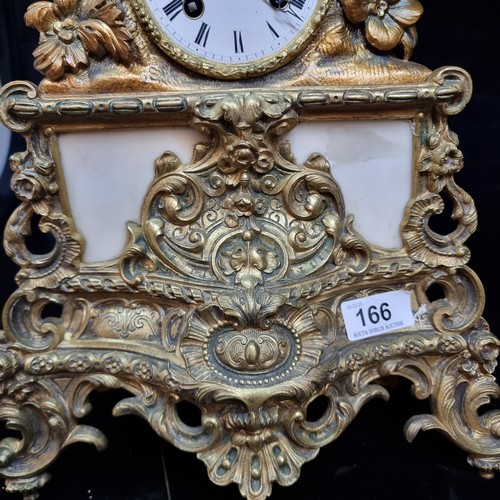 166 - Star Lot An antique gilt brass and spelter figure French 8 day mantel clock. Featuring cream marble ... 