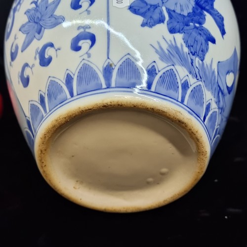 170 - Star Lot : A Large vintage  Chinese ceramic urn shaped vase, hand painted in a traditional blue and ... 