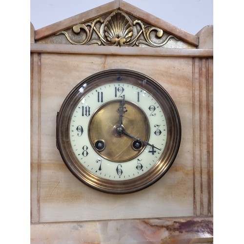 277 - Star lot : A superb early 20th Century Onyx mantel clock with brass detailing and enamel face.  From... 