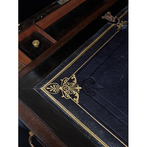 279 - Star lot :An incredible 19th Century walnut writing slope, opening to reveal a black leather writing... 