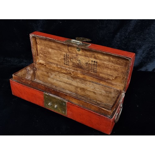 295 - A beautiful antique red lacquered leather Chinese scroll box. Features a hidden compartment to insid... 