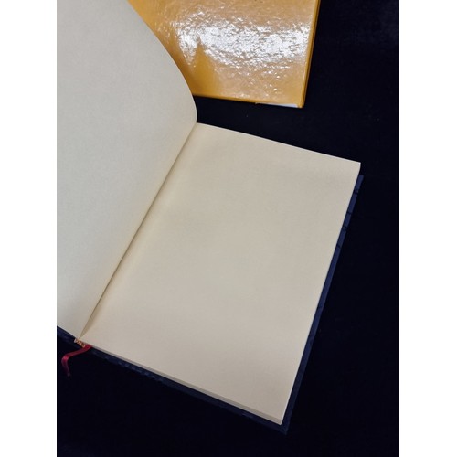 302 - A designer Shanghai Tang luxury padded silk notebook in original box.
Shanghai Tang is a Hong Kong l... 