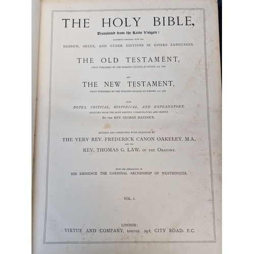 696 - A large Antique 19th-Century Leather-Bound Holy Bible features an embossed gilt cross motif, detaile... 