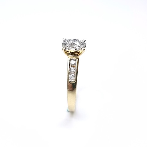 1105 - Super Star lot : A stunning 14ct yellow gold diamond ring. The centre diamond is approx 0.6cts and i... 