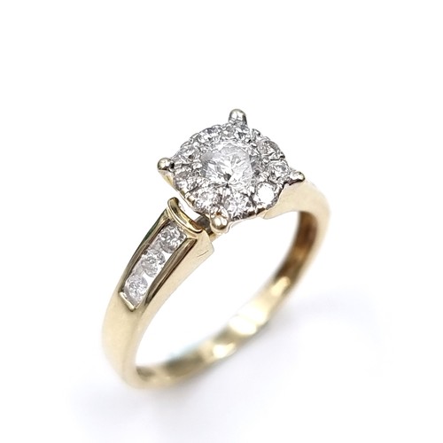 1105 - Super Star lot : A stunning 14ct yellow gold diamond ring. The centre diamond is approx 0.6cts and i... 