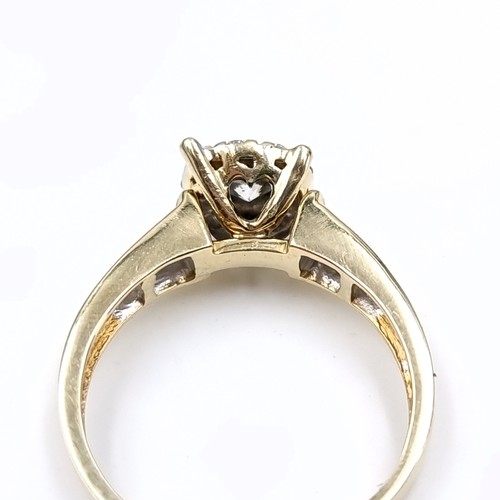 1105 - Super Star lot : A stunning 14ct yellow gold diamond ring. The centre diamond is approx 0.6cts and i... 