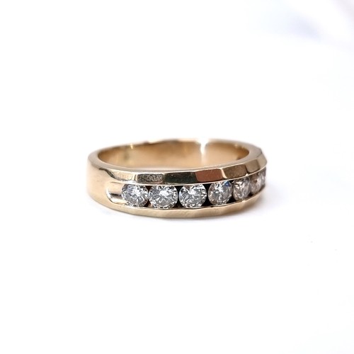 1106 - Super Star Lot : A Fabulous 14ct yellow gold channel set diamond ring, With 9 good size large inset ... 