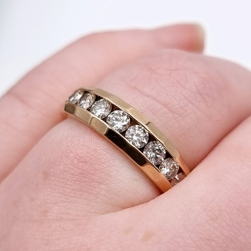 1106 - Super Star Lot : A Fabulous 14ct yellow gold channel set diamond ring, With 9 good size large inset ... 