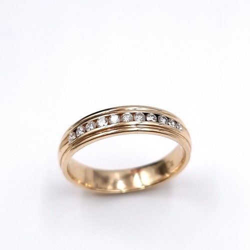 1107 - Super Star Lot : A Fabulous 14ct yellow gold channel set diamond ring, With 12 inset diamonds 0.6cts... 