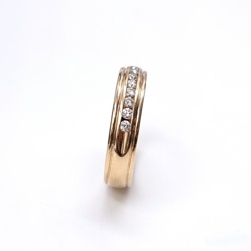 1107 - Super Star Lot : A Fabulous 14ct yellow gold channel set diamond ring, With 12 inset diamonds 0.6cts... 