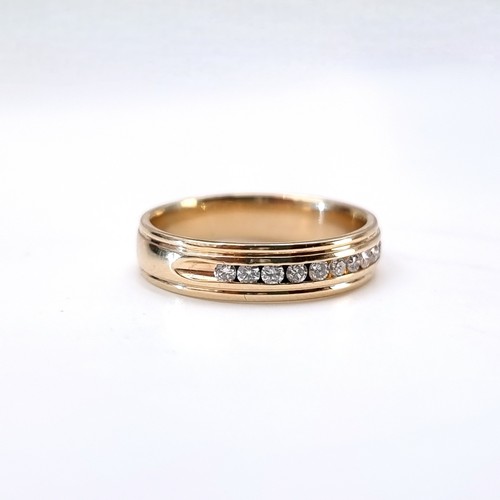 1107 - Super Star Lot : A Fabulous 14ct yellow gold channel set diamond ring, With 12 inset diamonds 0.6cts... 