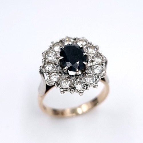 1108 - Star Lot : A Lovely large vintage Sapphire and gemset flower ring, 2 carat Sapphire with a large rou... 